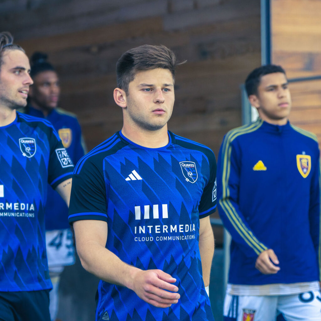 Cam Cilley walking out of the tunnel at a match