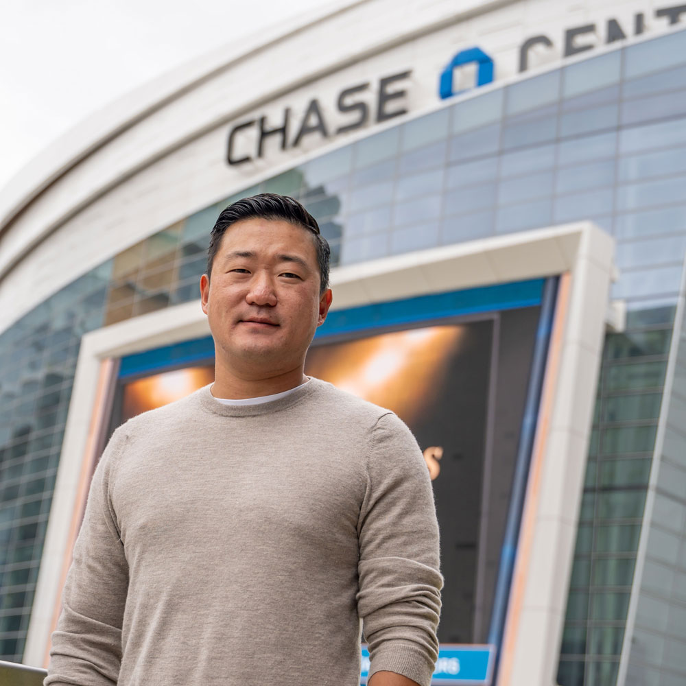 Min Park standing in front of the Chase Center